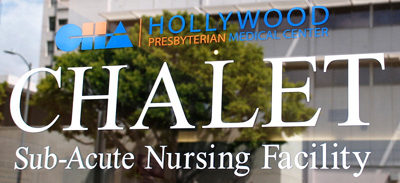 Logo and Window Sign for Chalet: Sub Acute Long Term Care Unit at Hollywood Presbyterian Medical Center, sunny day