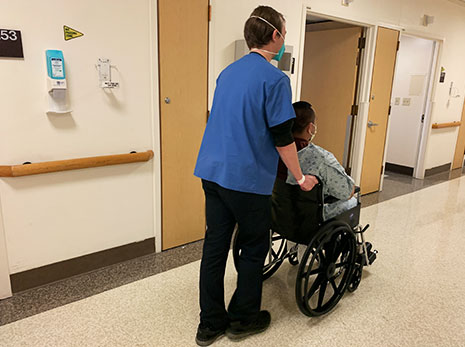 Patient Transporter William Knecht Comforts Patients along the Way with Conversation